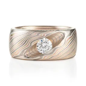 Mokume Gane Twist Ring with Diagonal Channel Set Diamond